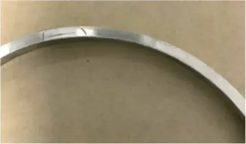 Macroscopic morphology of defects in AgCuV alloy conductive slip ring
